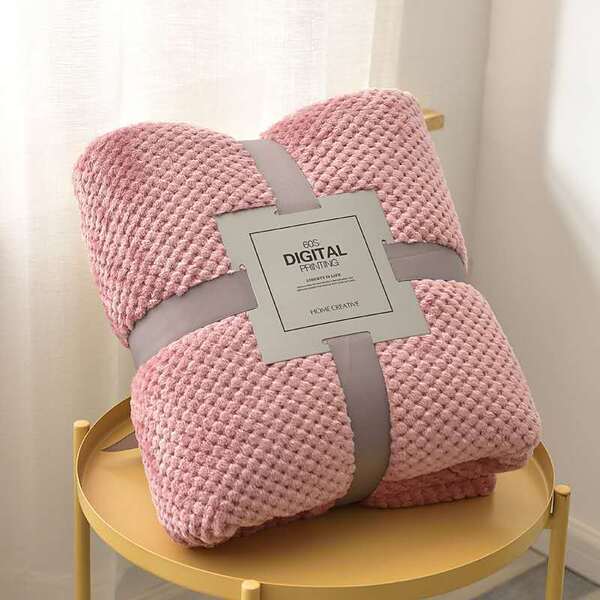 Couvre lit édredon rose clair