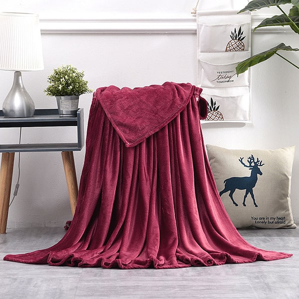 Couvre lit fausse fourrure rouge