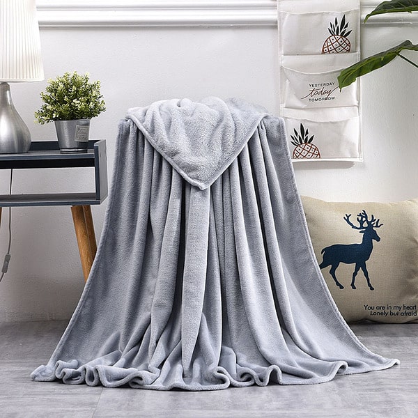 Couvre lit fausse fourrure gris