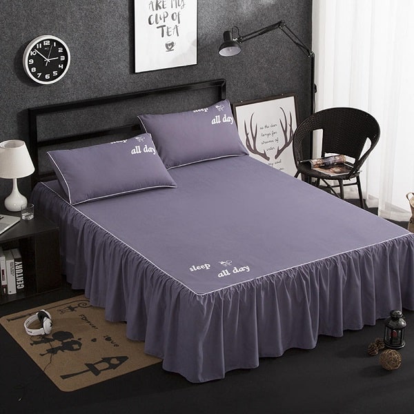 Cache sommier bleu marine