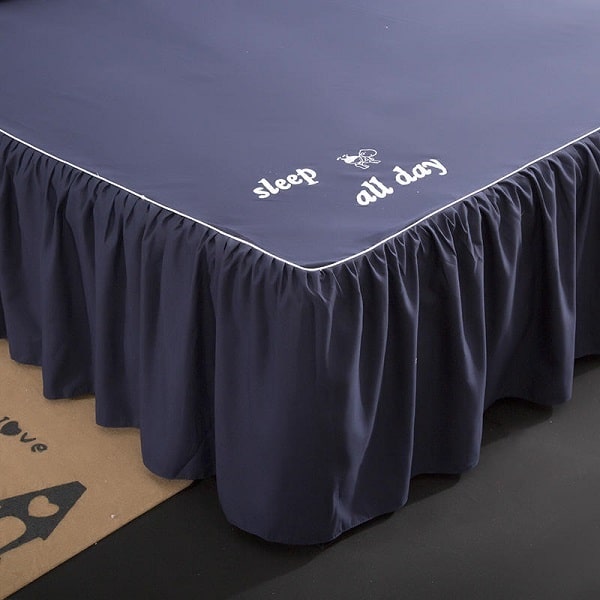 Cache sommier bleu marine
